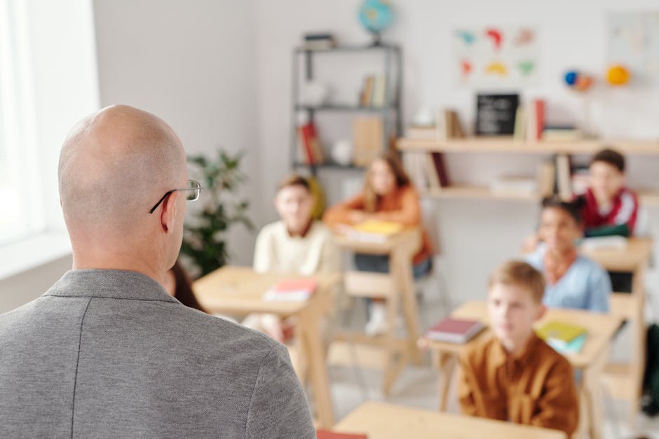 Teacher leading a classroom discussion
